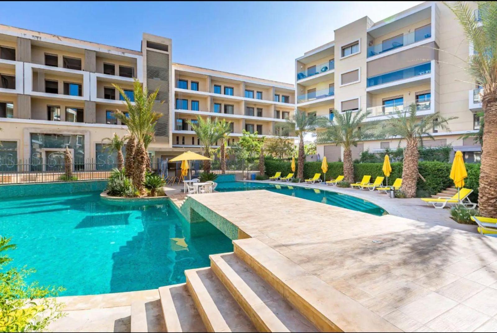 Appartement Luxueux Avec Piscine 10 Minutes Du Centre Ville Marrakesh Extérieur photo